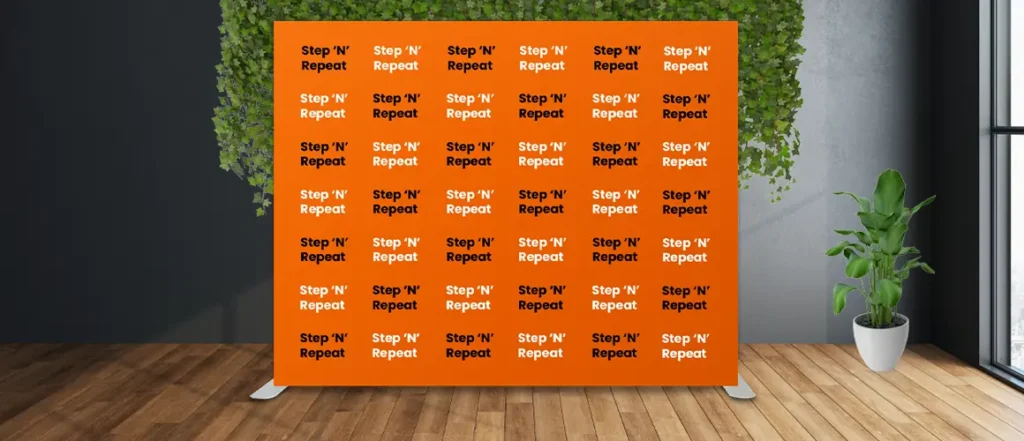 Orange and White Step and Repeat Display